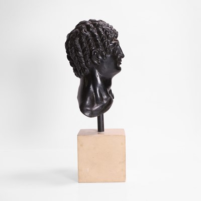 Lot 49 - A grand tour black marble bust of a man