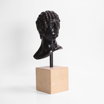 Lot 49 - A grand tour black marble bust of a man