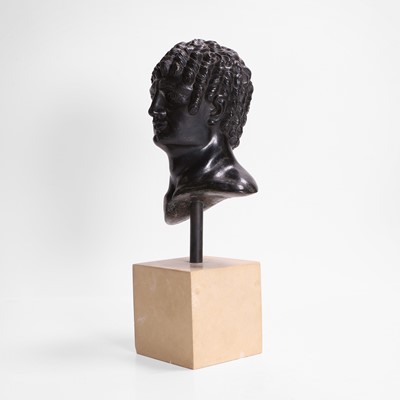 Lot 49 - A grand tour black marble bust of a man
