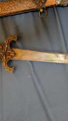 Lot 448 - An Ottoman gold-damascened steel kilij sword