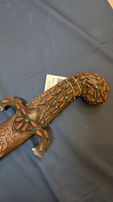 Lot 448 - An Ottoman gold-damascened steel kilij sword