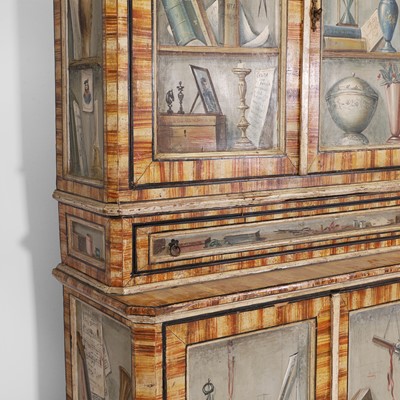 Lot 336 - A large painted tromp l'oeil cabinet