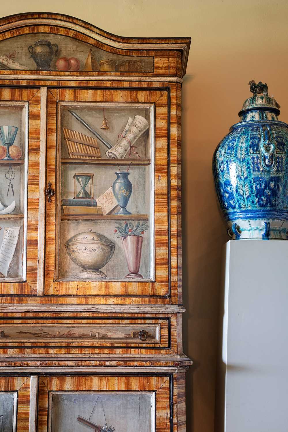 Lot 336 - A large painted tromp l'oeil cabinet