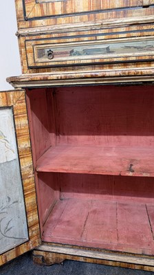 Lot 336 - A large painted tromp l'oeil cabinet