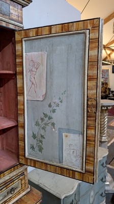 Lot 336 - A large painted tromp l'oeil cabinet