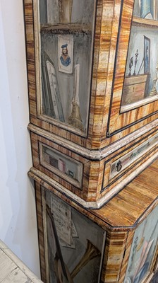 Lot 336 - A large painted tromp l'oeil cabinet