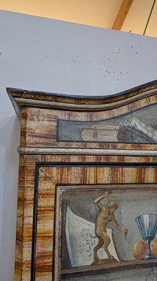 Lot 336 - A large painted tromp l'oeil cabinet