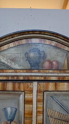 Lot 336 - A large painted tromp l'oeil cabinet