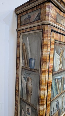 Lot 336 - A large painted tromp l'oeil cabinet