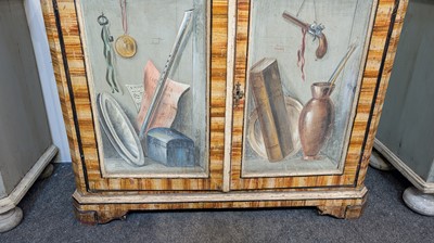 Lot 336 - A large painted tromp l'oeil cabinet