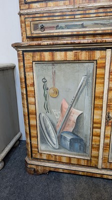 Lot 336 - A large painted tromp l'oeil cabinet