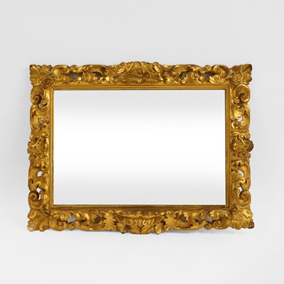 Lot 100 - A Florentine carved giltwood mirror