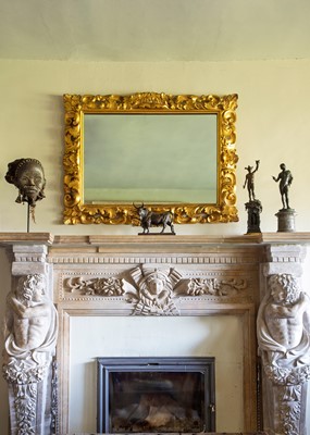 Lot 100 - A Florentine carved giltwood mirror
