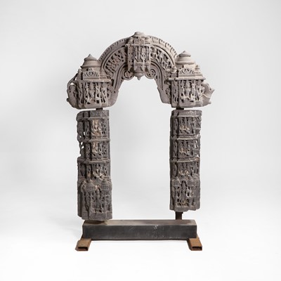 Lot 551 - A carved stone arch