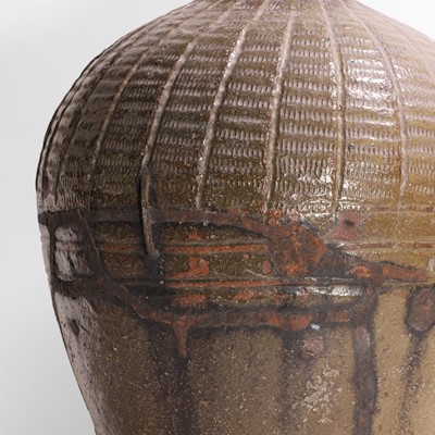 Lot 137 - A large green-glazed pottery vase