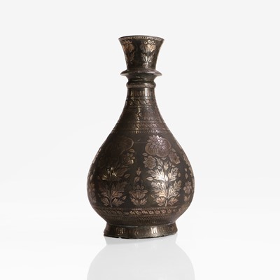 Lot 418 - A silver-inlaid bidri bottle vase