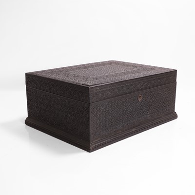 Lot 421 - A carved ebony casket