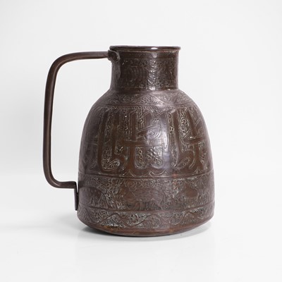 Lot 455 - A copper water pitcher