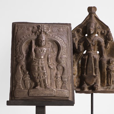 Lot 540 - A white-metal votive plaque