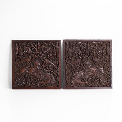 Lot 541 - A pair of relief carved hardwood plaques