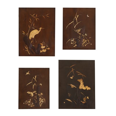 Lot 621 - A group of four lacquered and ivory inlaid screen panels