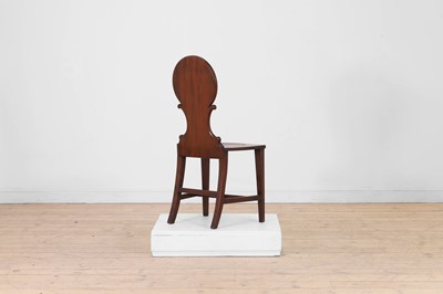 Lot 7 - A George III mahogany hall chair