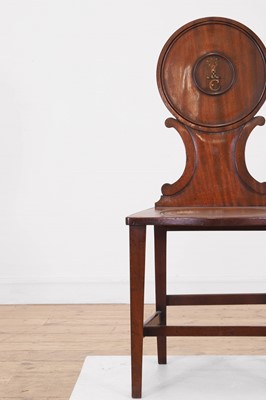 Lot 7 - A George III mahogany hall chair
