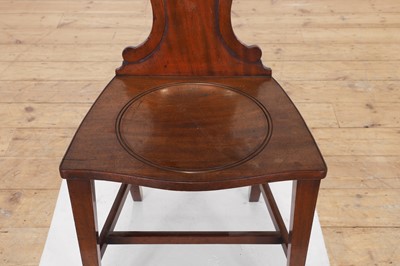 Lot 7 - A George III mahogany hall chair
