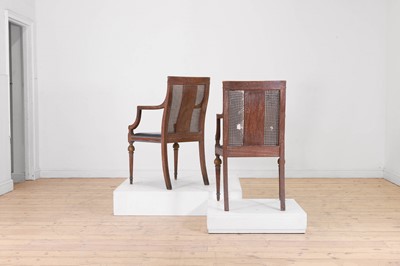 Lot 52 - A set of six oak and cane elbow chairs