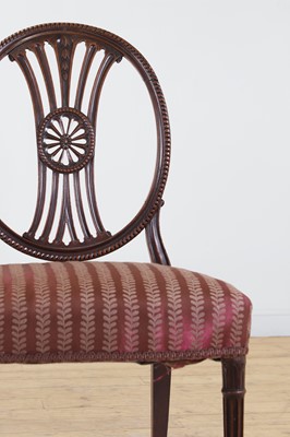 Lot 39 - A pair of George III Hepplewhite-style mahogany side chairs
