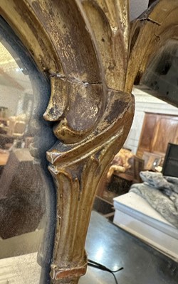 Lot 44 - A George III-style carved giltwood overmantel mirror
