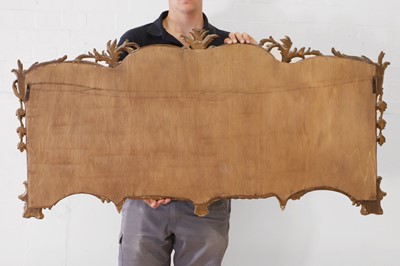 Lot 44 - A George III-style carved giltwood overmantel mirror