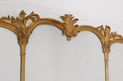 Lot 44 - A George III-style carved giltwood overmantel mirror