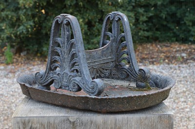 Lot 57 - A neoclassical-style cast iron boot scraper