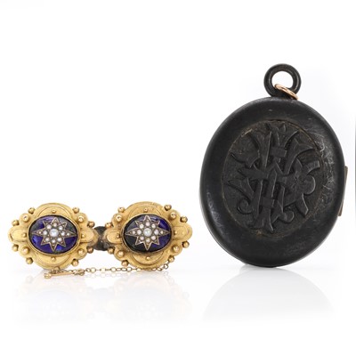 Lot 288 - A Victorian enamel split pearl brooch and a Victorian jet locket