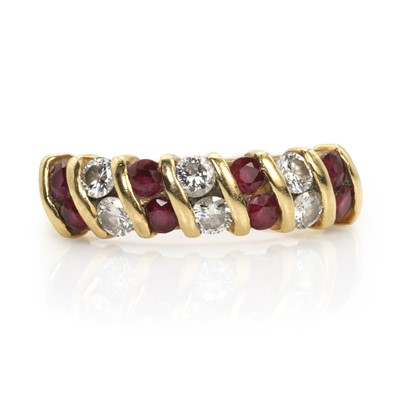 Lot 91 - An 18ct gold ruby and diamond ring