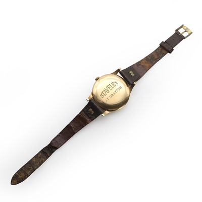 Lot 36 - A gold Trebex mechanical strap watch, a silver pocket watch and a silver fob watch