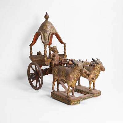 Lot 410 - A polychrome-painted and carved model of an ox-drawn carriage