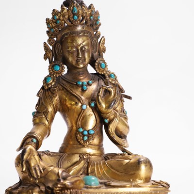 Lot 125 - A gilt-bronze bodhisattva