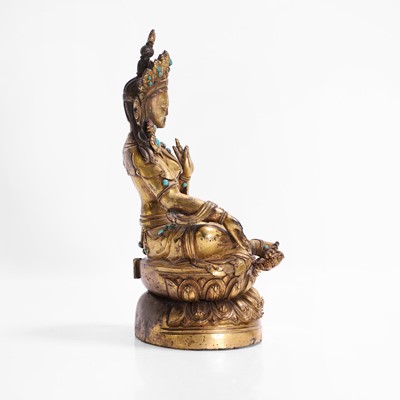 Lot 125 - A gilt-bronze bodhisattva