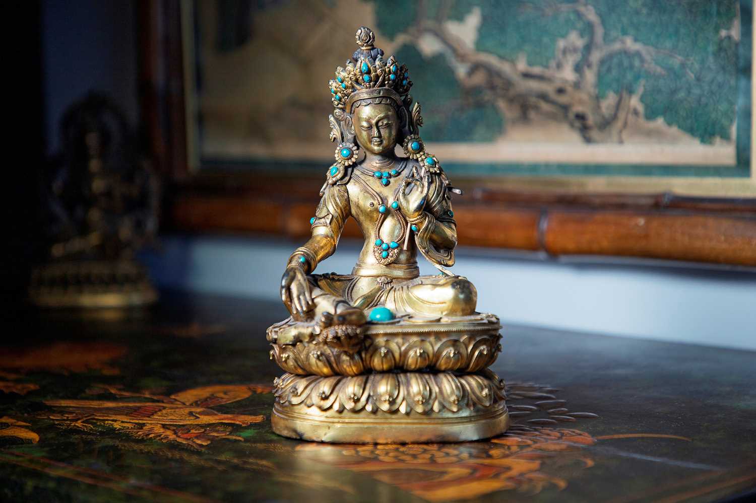 Lot 125 - A gilt-bronze bodhisattva