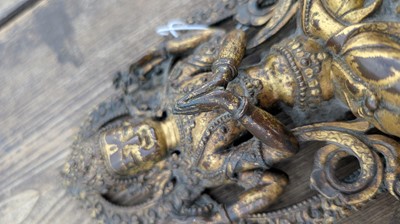 Lot 124 - A gilt-copper bodhisattva