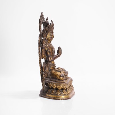 Lot 124 - A gilt-copper bodhisattva