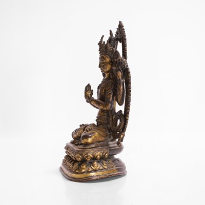 Lot 124 - A gilt-copper bodhisattva