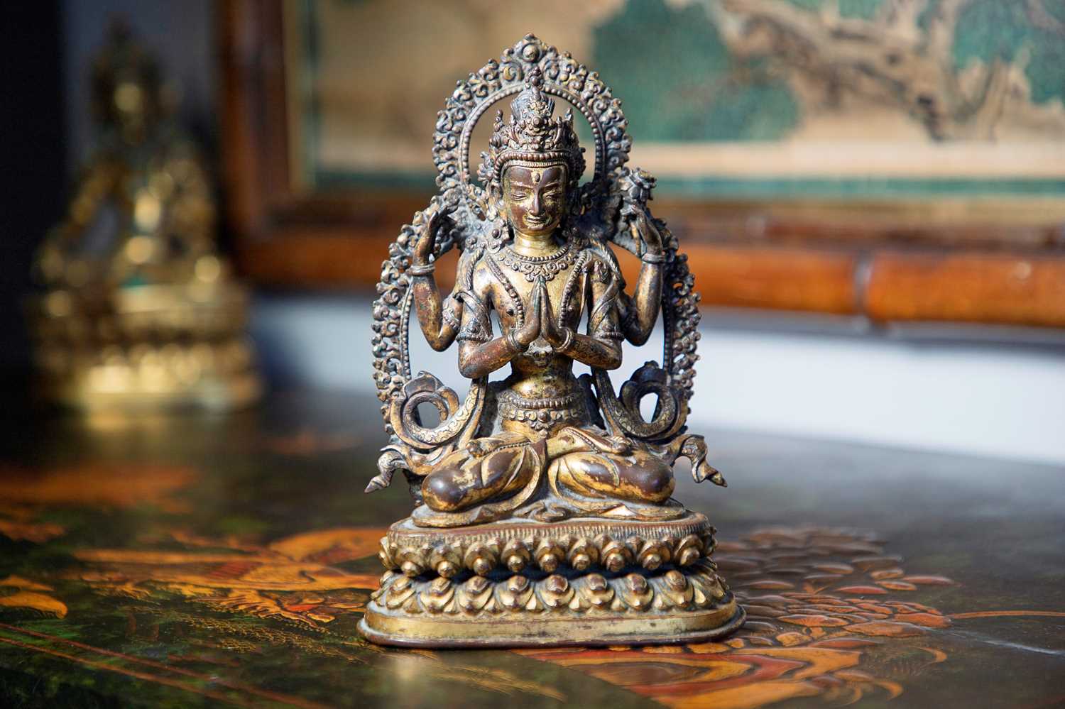 Lot 124 - A gilt-copper bodhisattva