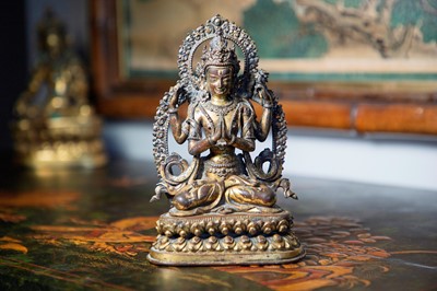 Lot 124 - A gilt-copper bodhisattva