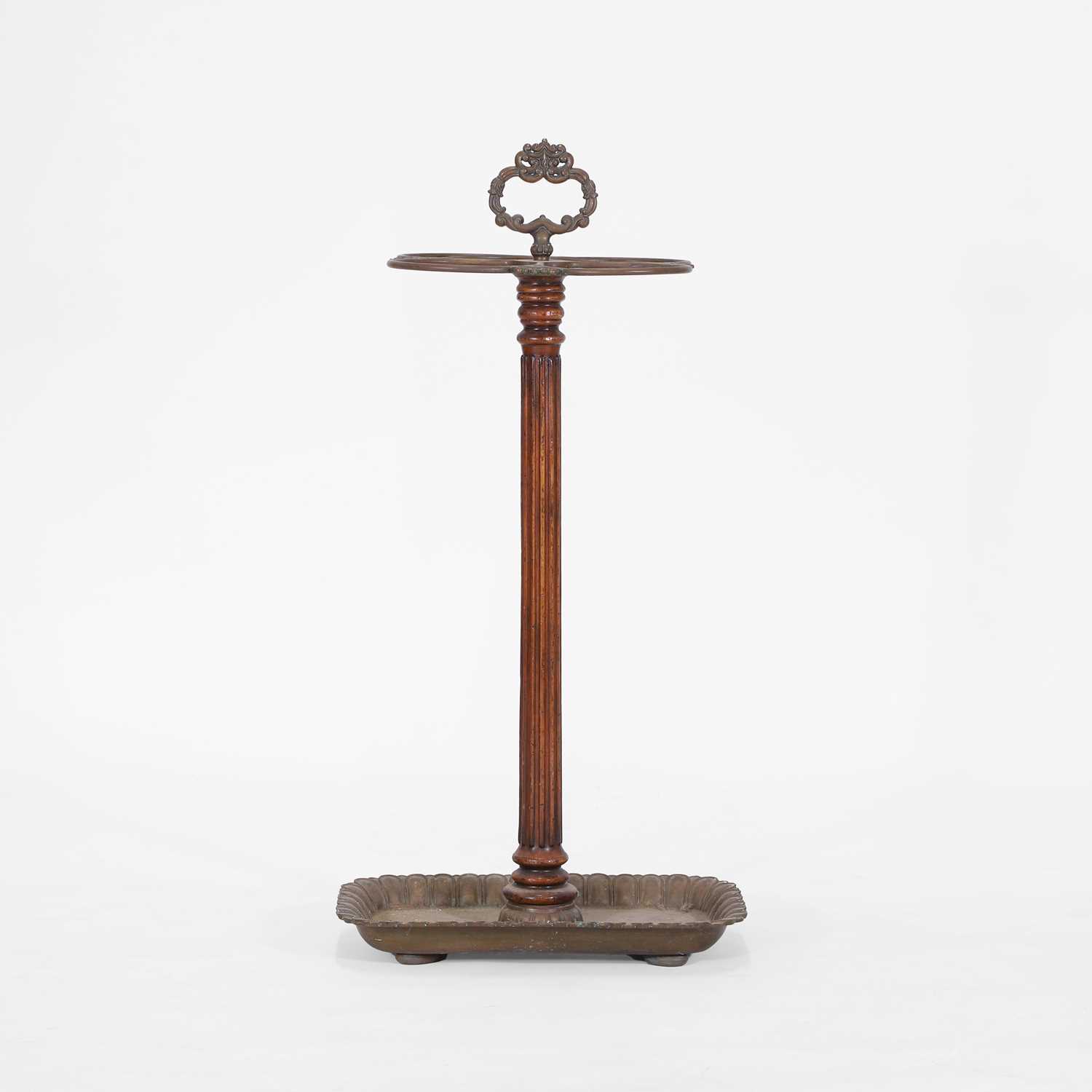 Lot 80 - A walnut and brass stick stand