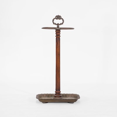 Lot 80 - A walnut and brass stick stand