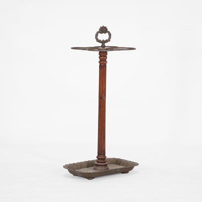 Lot 80 - A walnut and brass stick stand