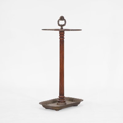Lot 80 - A walnut and brass stick stand